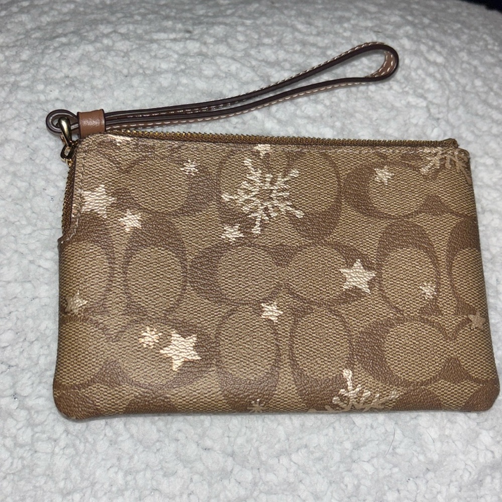 Coach wristlet  stars, and snowflakes